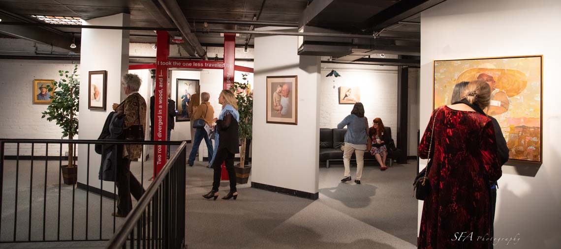 Photo of a portrait exhibition at the Art Station